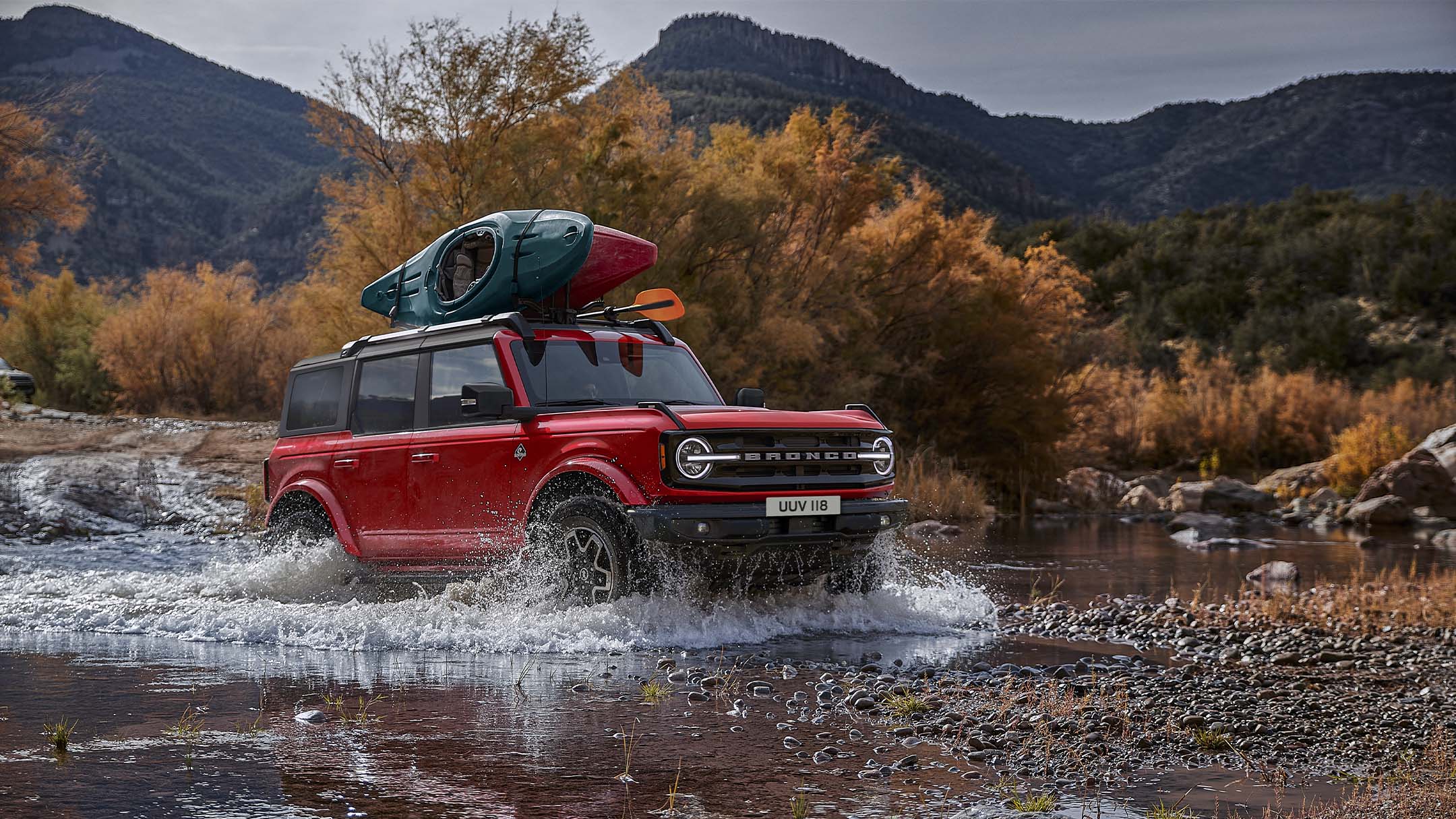 Ford Bronco Driving Through A Small Lake In