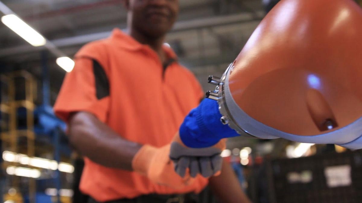 Car Workers And Mini Robots Work Hand In Hand 5